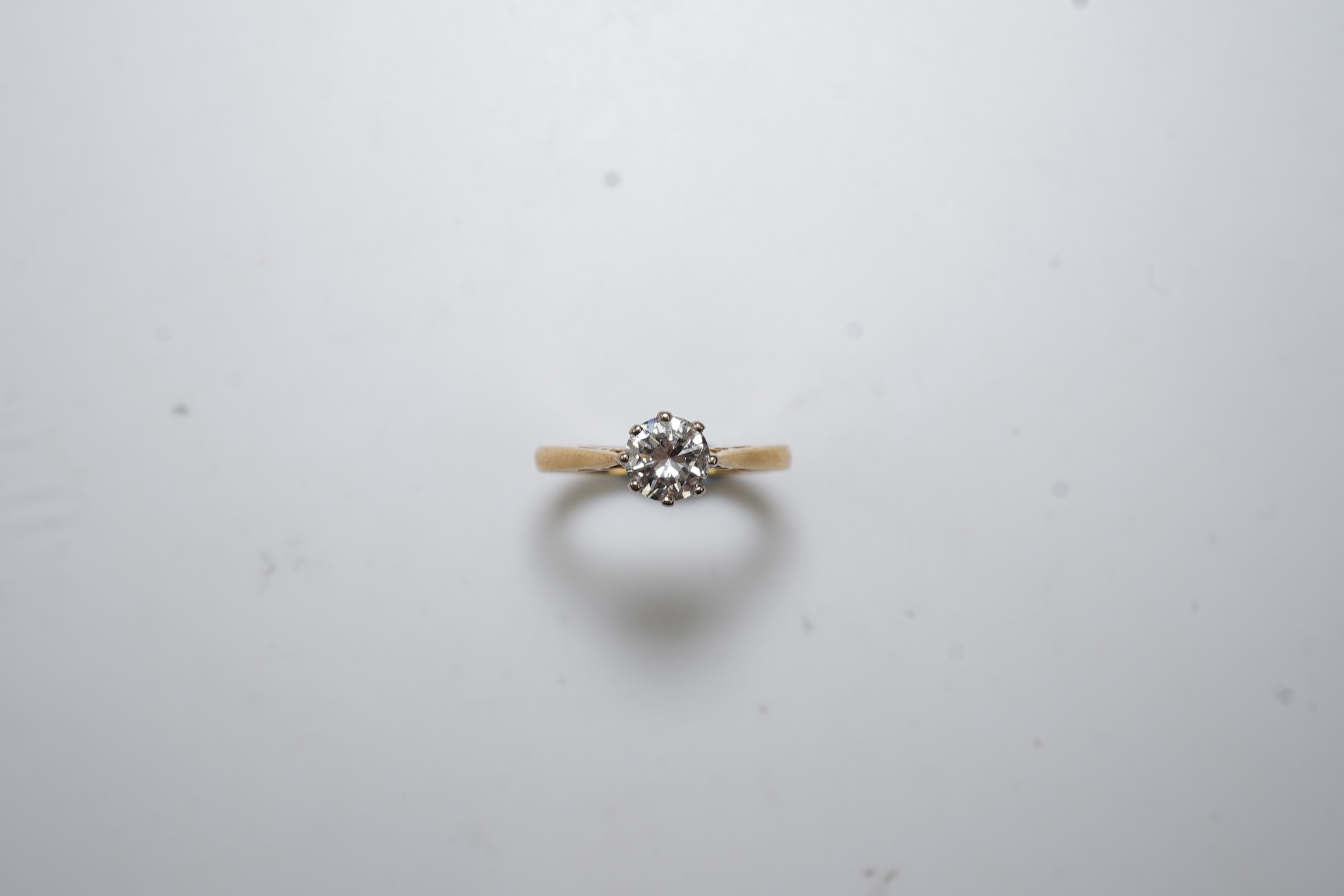 A diamond solitaire ring